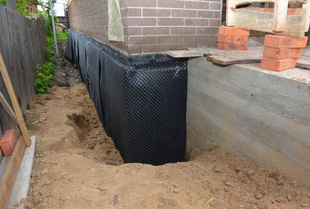 Happy homeowners after waterproofing job in Rickman